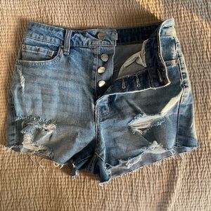 Distressed blue jean shorts
